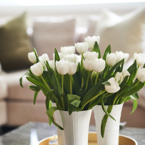 pretty coffee table display - gold tray and white tulips - linda mazur design