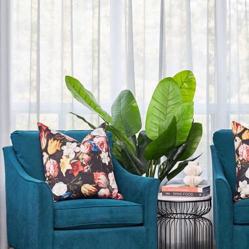 newmarket condo decorating - pretty blue chairs - floral pillows - sitting area - living room - blue sheer curtains - pattern play mixing patterns - linda mazur design