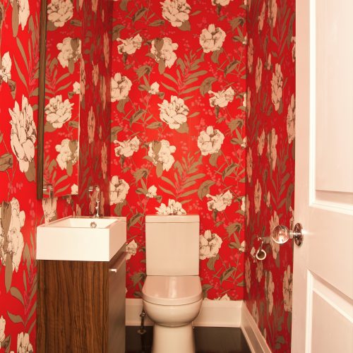 small space powder room - tiny powder room - small wall hung vanity - bright floral wallpaper - small space living - linda mazur design toronto designer york region designer