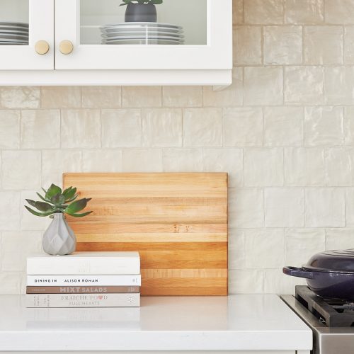 markham kitchen renovation cream custom millwork with square mallorca tile backsplash and glass cabinetry - custom range hood - luxury kitchen - family home - linda mazur design