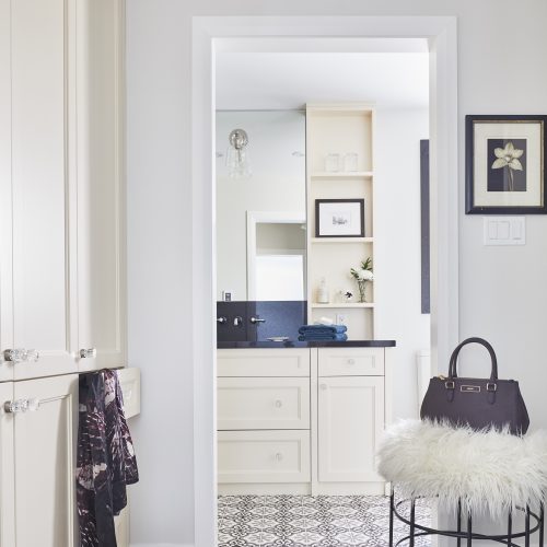 black and cream master ensuite - newmarket homes - black quartz counters with wall mount faucets - custom vanity millwork - cement tile floor - patterned floor - linda mazur design toronto designer - small space challenges york region designer york region living