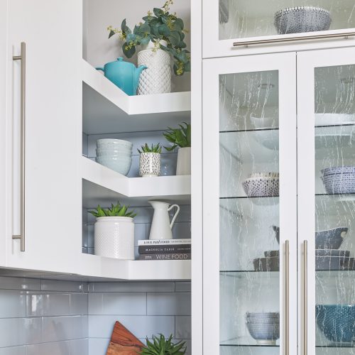 cottage kitchen vaulted ceiling -custom face frame white kitchen cabinets - modern luxury kitchen, family home - kitchen with open corner shelving and textured glass cabinets -quartzite countertops - subway tile backsplash- modern kitchen - linda mazur design - toronto designer