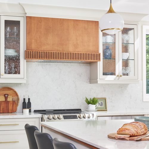 mississauga custom kitchen renovation - coffee station and pantry area - wood cabinetry and glass door front - toronto designer linda mazur design - kitchen island with quartz counters - transitional kitchen