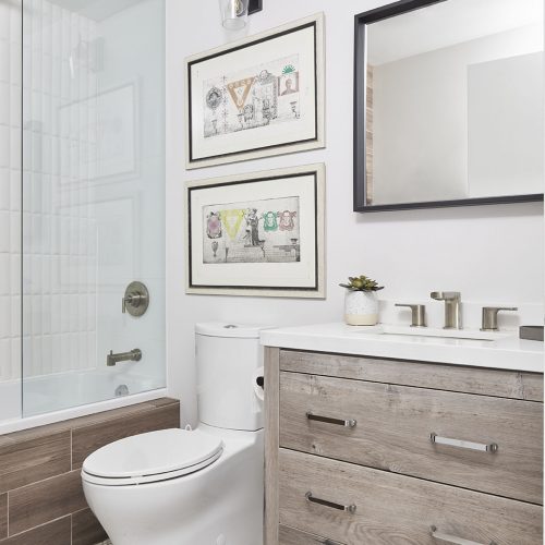 condo bathroom renovation, rustic bathroom, wood vanity, mosaic floor tile, tub and shower combo, toronto condos, toronto designer linda mazur design