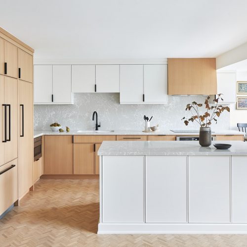 toronto condo kitchen renovation scandi, black barstool vignette, quartz counter tops, natural wood cabinets, two colour cabinets, white cabinets, custom kitchen, herringbone floors, toronto designer, linda mazur design